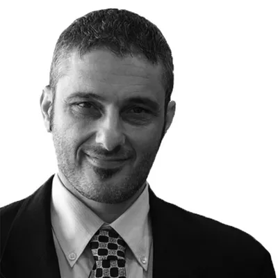Dr. Godwin Caruana - Founding Partner